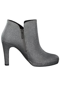 Bottine femme à motif pied-de-poule noir et blanc, fermeture éclair latérale, bout pointu et talon haut stilettos.