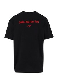Black cotton t-shirt featuring red text on the back that reads "Osaka • Paris • New York" with a small logo detail underneath.