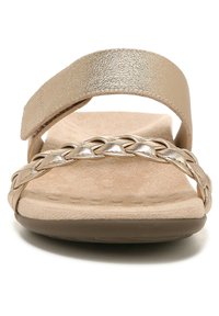 Gold synthetic slide sandal with a wide strap and braided detail across the footbed. The sole is brown with a textured finish.