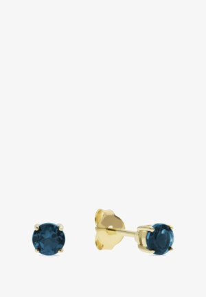 Runde Ohrstecker mit tiefblauen Edelsteinen, die in goldfarbenem Metall mit glatter Oberfläche gefasst sind und über eine sichere Befestigung verfügen.
