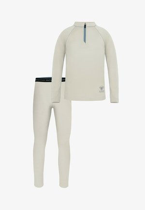 Hellbeige langärmeliges Funktionsunterhemd mit Viertel-Reißverschluss am Kragen, kombiniert mit passenden Leggings. Verfügt über kontrastierende Nähte und einen gebrandeten Taillenbund.