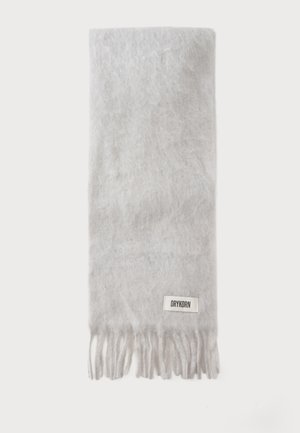 Écharpe douce en laine gris clair avec des extrémités frangées et une petite étiquette blanche avec un texte noir "DRYKORN" près d'un bord.