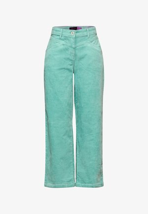 Groene corduroy wijde broekspijpen met een subtiele textuur, uitgerust met voorzakken en een enkele knoopsluiting aan de taille.