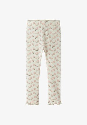 Leggings blancs côtelés avec un petit motif floral rose et des ourlets à volants, conçus pour les enfants.