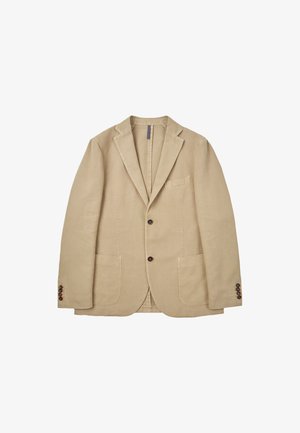 Beżowa lniana marynarka z wykładanym kołnierzem, dwiema przednimi kieszeniami naszytymi i mankietami na trzy guziki. Posiada delikatną teksturę i prosty design.