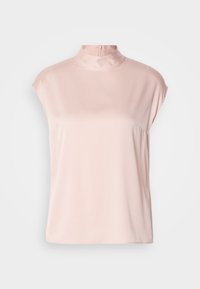 Camicetta rosa chiaro a maniche corte con colletto alto e chiusura a zip sul retro. Texture liscia, vestibilità morbida e senza motivi o decorazioni visibili.