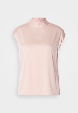 Lys pink skjorte med korteærmer, høj krave og lynlås lukning bagpå. Glat tekstur, løs pasform og ingen synlige mønstre eller udsmykninger.