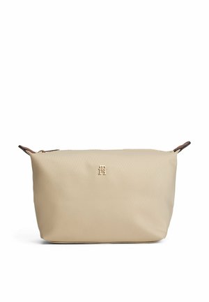 Beige nylon pouch bag with gold logo, zip closure, and brown leather accents. Smooth texture, rectangular shape, and minimalistic design.