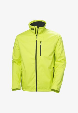 Světlá žlutá bunda vyrobená z voděodolného materiálu. Má vysoký límec, přední zip a černé akcentové zipy. Je lehká a má hladký povrch.