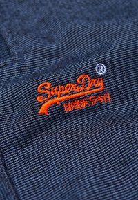 Superdry & Co Spodnie treningowe