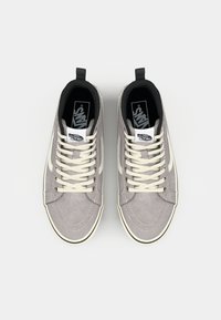 Gray suede high-top sneakers with white laces and side stripe, featuring a black interior lining and black Vans logo on the tongue.