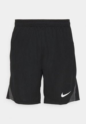 Pantalones cortos deportivos negros hechos de un tejido ligero, que presentan un patrón texturizado, cortes laterales y un logo de Nike blanco en la parte inferior izquierda.