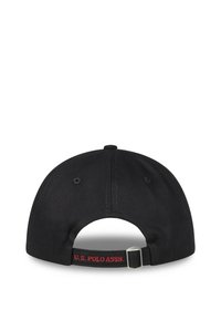 Black cotton baseball cap featuring a curved brim, adjustable strap at the back, and "U.S. POLO ASSN." embroidered in red.