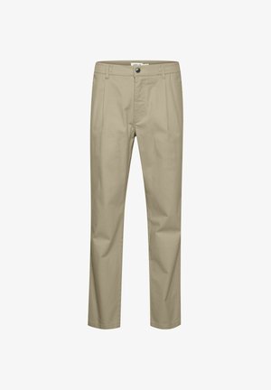 Bež bombažne chino hlače s ravnim sprednjim delom, stranskimi žepi, zankami za pas in zadrgo z gumbom za zapenjanje. Tekstura z efektnim pranjem (acid wash).