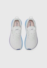 White athletic shoes with blue and purple accents. Lightweight, breathable fabric upper features textured pattern and traditional lace closure.