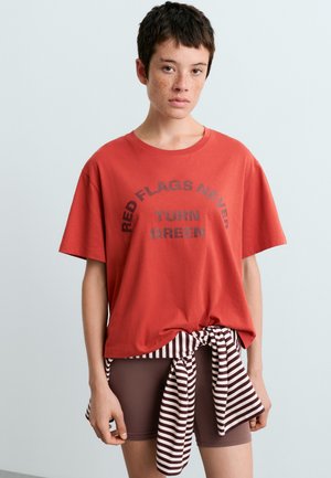OYSHO Tričko s potlačou - burnt orange