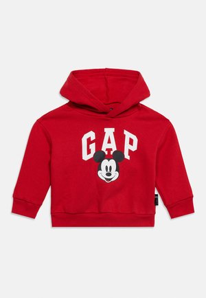 Sweat à capuche rouge pour tout-petit avec logo GAP blanc et visage de Mickey Mouse centré sous la capuche, manches longues, poignets et ourlet à côtes.