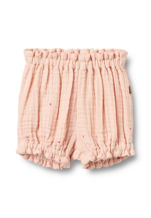 Pantalones cortos de algodón rosa con un diseño texturizado y arrugado. Cuenta con una cintura elástica y dobladillos con volantes, con pequeñas salpicaduras rojas por todo el tejido.