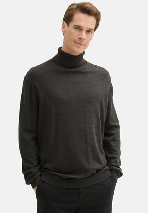 Pull à col roulé gris foncé avec des manches longues, fabriqué en matériau doux, présentant une coupe décontractée et des bords côtelés aux poignets et à l'ourlet.