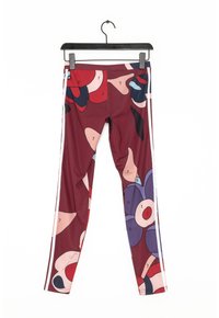 Vinröda leggings med abstrakta blommönster i rosa, blått och svart. Sidoeffekter i vitt. Slät, elastisk tyg.