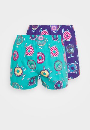 Bunte Baumwoll-Boxershorts in Teal und Lila mit verspielten Donut-Mustern. Eigenschaften sind ein elastischer Bund, lockere Passform und cartoonartige Donut-Charaktere.