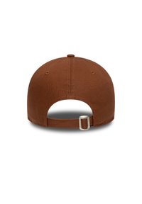 Brown cap featuring a smooth fabric, rounded crown, adjustable strap, and a small rear opening. Simple, minimalistic design with no patterns.