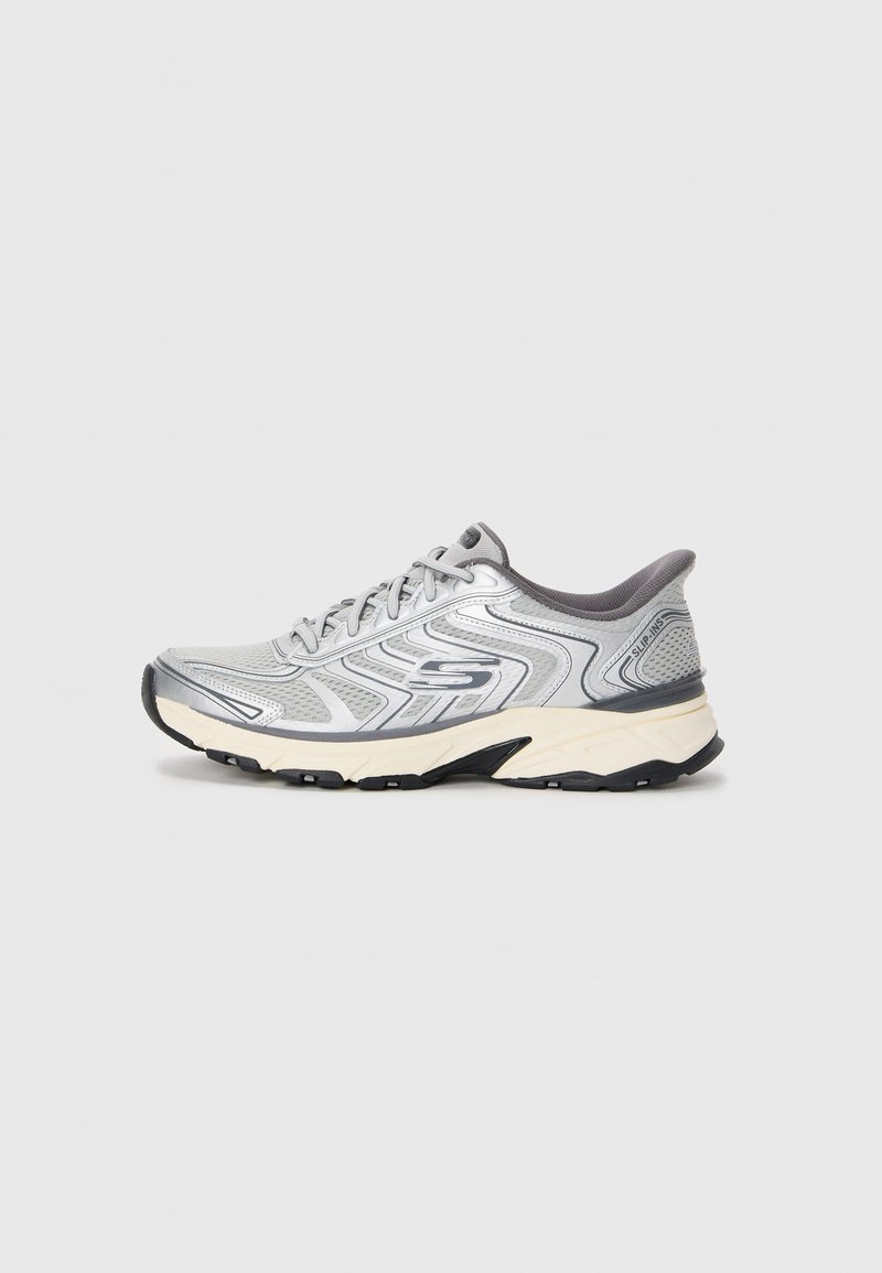 Gray and white athletic sneaker with lace-up closure, black sole, and "Slip-Ins" label on the heel, shown in side profile on white background.