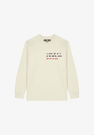 Maglia a maniche lunghe color crema in cotone, con testo stampato in nero e rosso sul davanti, scollo rotondo e polsini a costine.