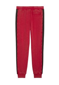 Røde velour sweatpants med sorte sidestropper, elastisk talje og en enkelt baglomme. Blød tekstur, afslappet pasform.