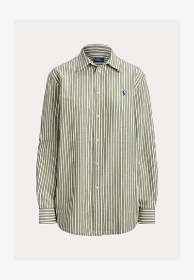 Zaļi un balti svītrains krekls ar pogām, kokvilnas audums, garas piedurknes, klasisks apkakle, kreisajā krūtīs tumši zils logo, vienkāršas aproces.