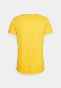 Tommy Jeans SLIM JASPE CREW NECK - T-shirt básica - pollen