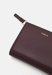 Furla NUVOLA S COMPACT WALLET L ZIP - Piniginė - chianti