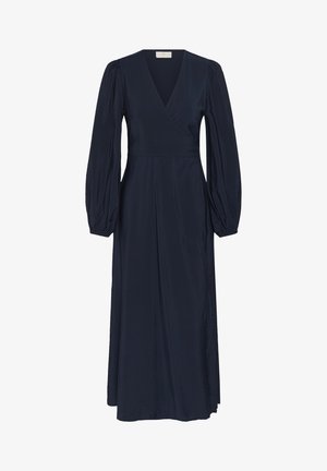 Tumesinist värvi pika varrukaga midi-kleit V-kaelusega, kortsuliste õhuke varrukate, keha ümber vormitud talje ja voolava seelikuga.