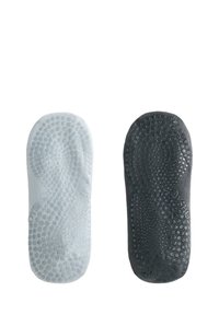 Gray and light gray no-slip socks with textured rubber grips on the bottom, featuring a seamless design and smooth knit material.