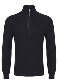 Schwarzer Strickpullover mit hohem Kragen und einem Reißverschluss vorne. Verfügt über eine gerippte Struktur und lange Ärmel. Einfaches Design ohne Muster.