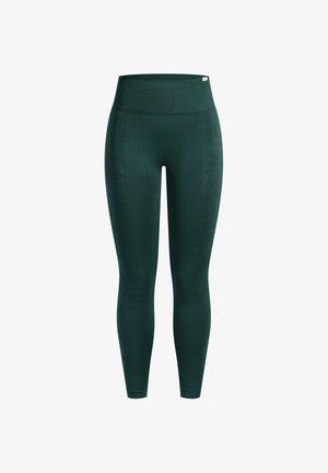 Mørkegrønne leggings med høj talje. Fremstillet af et glat, elastisk stof med diskrete detaljer på sidesømmene. Ingen synlige metaldele.