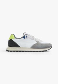 Running shoe featuring a white mesh and suede upper, gray and black accents, and a bright green heel detail. Rubber outsole for traction.