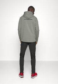 ICANIWILL STRIDE WORKOUT PANTS - Treningo apatinė dalis - black