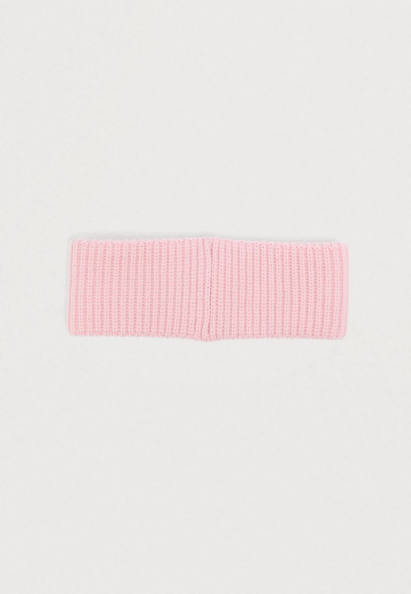 Pink knitted hairband with a ribbed texture, featuring a seamless design and soft fabric for comfortable wear.