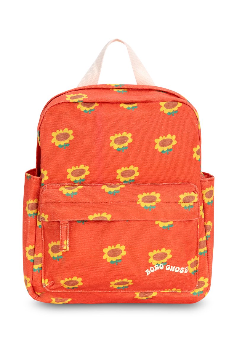 Sac à dos orange avec motif de tournesols, poche avant et logo blanc. Fabriqué en tissu texturé, il dispose d'une poignée supérieure et de deux poches latérales.