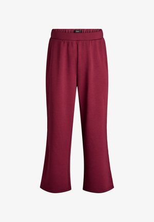 Burgundy cropped sweatpants with an elastic waistband, made from soft, textured fabric. Features a relaxed fit and wide legs.