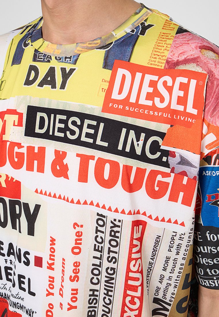 Nahaufnahme eines bunten Diesel-T-Shirts mit fettem Text und grafischen Drucken, einschließlich Phrasen wie "TOUGH & TOUGH" und "DIESEL INC."