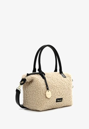 Cream textured fabric handbag with black leather straps, a detachable shoulder strap, and a gold-tone logo tag.