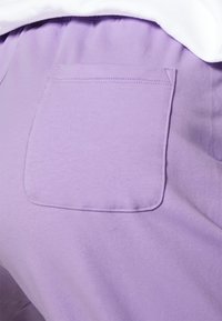 Champion Teplákové kalhoty - lilac