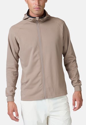 Beige lightweight zip-up hoodie with a hood, long sleeves, and a smooth texture. Seam detailing runs along the shoulders and sleeves.