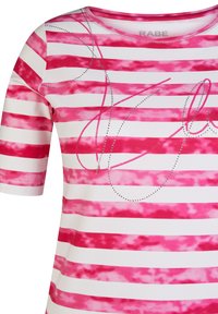 Pink and white striped T-shirt with short sleeves, made of soft fabric, featuring a wavy line design and silver embellishments.