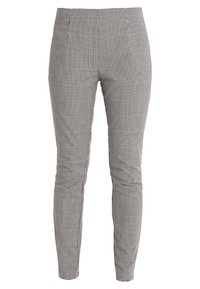 Czarno-białe spodni w kratkę o dopasowanym kroju, gładkiej fakturze, płaskim przodzie i bez widocznych akcesoriów. Odpowiednie do codziennego noszenia.
