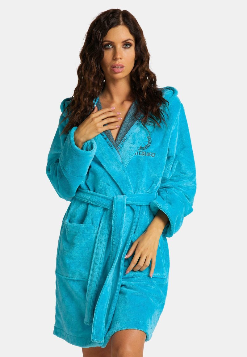 Turquoise bathrobe made of soft, plush fabric; features a hood, belt, and two front pockets; has contrasting inner lining and embroidery.