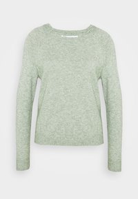 Ljust grön tröja i mjukt stickat material, med rund hals, långa ärmar och ribbad fåll. Minimalistisk design utan mönster.