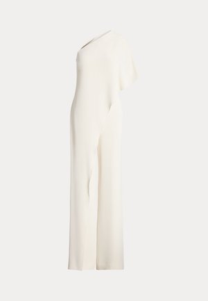 Macacão assimétrico de um ombro só em tecido branco suave. Apresenta pernas largas e um caimento suave. Design minimalista sem ferragens visíveis.